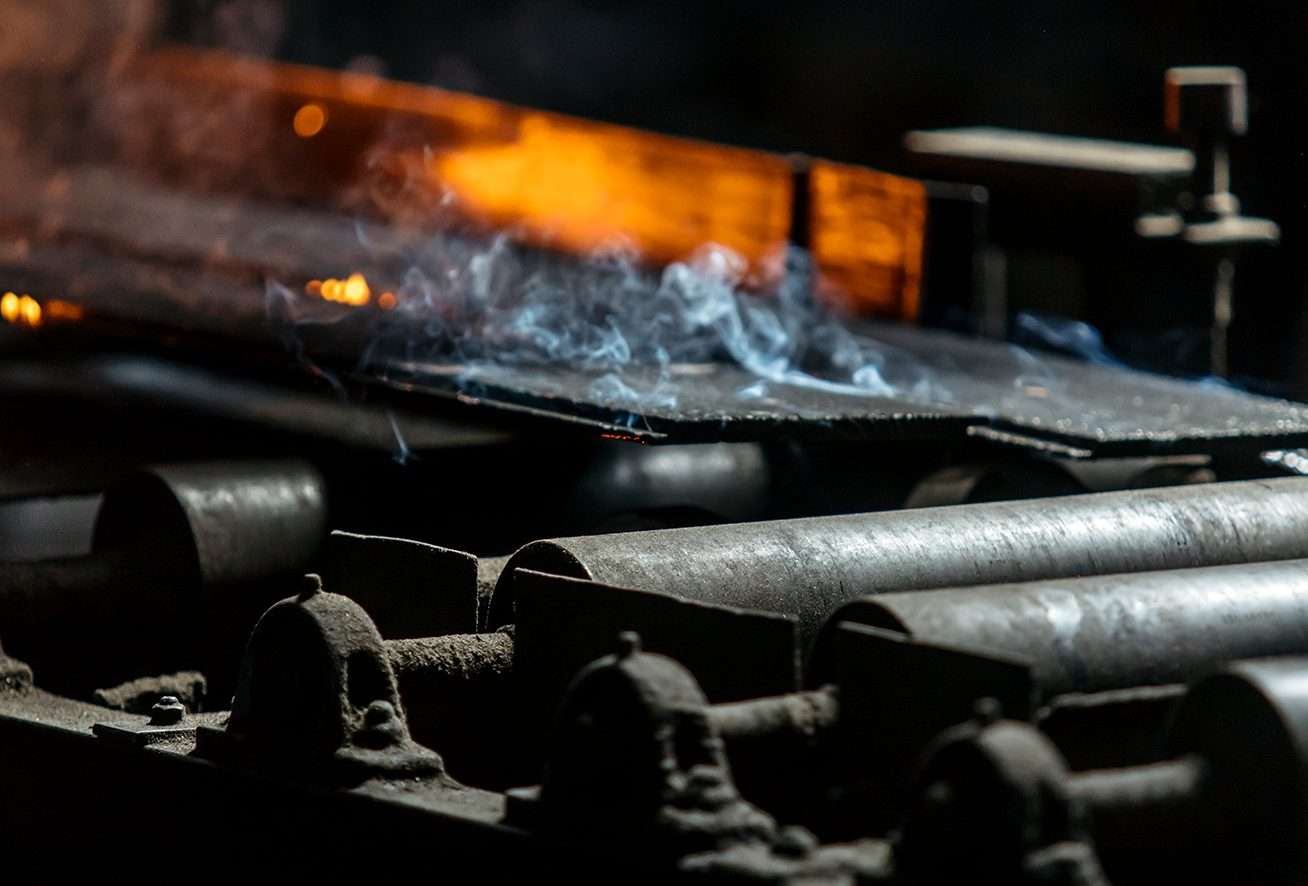 Japanese cedar being charred in the Yakisugi a.k.a Shou Sugi Ban production process to create carbonised timber.
