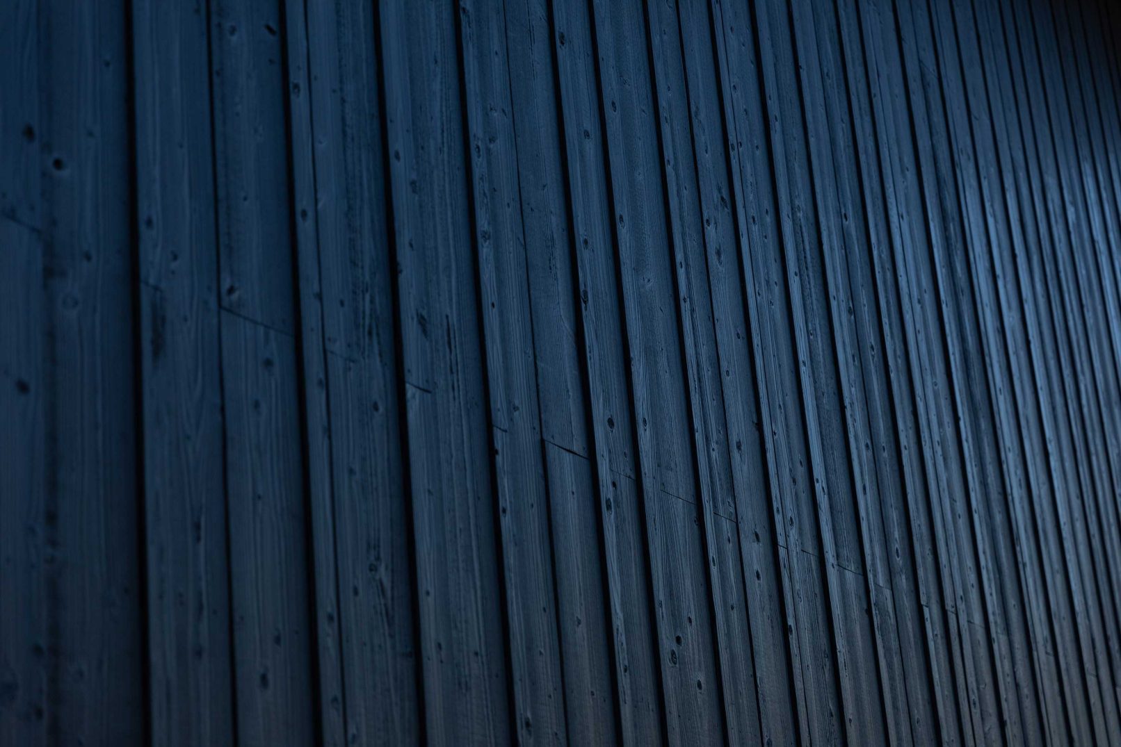 Vertical Yakisugi a.k.a Shousugiban charred cedar cladding facade.