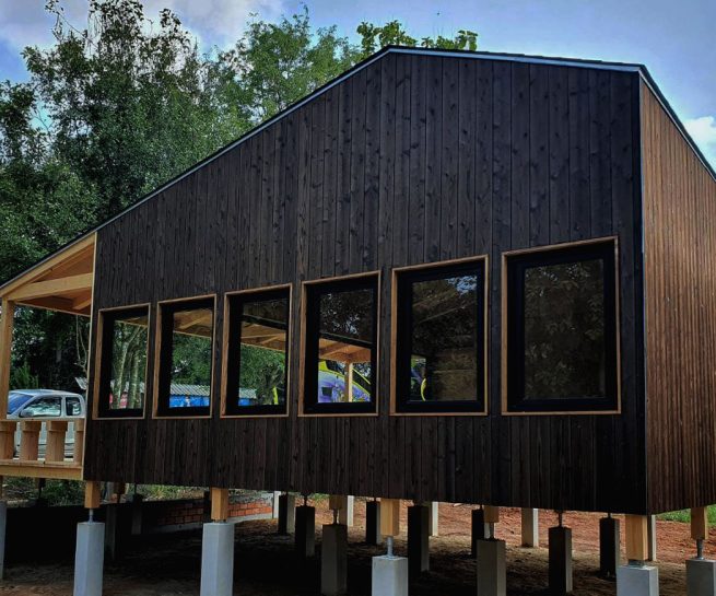 Thailand House featuring yakisugi charred Japanese cedar cladding