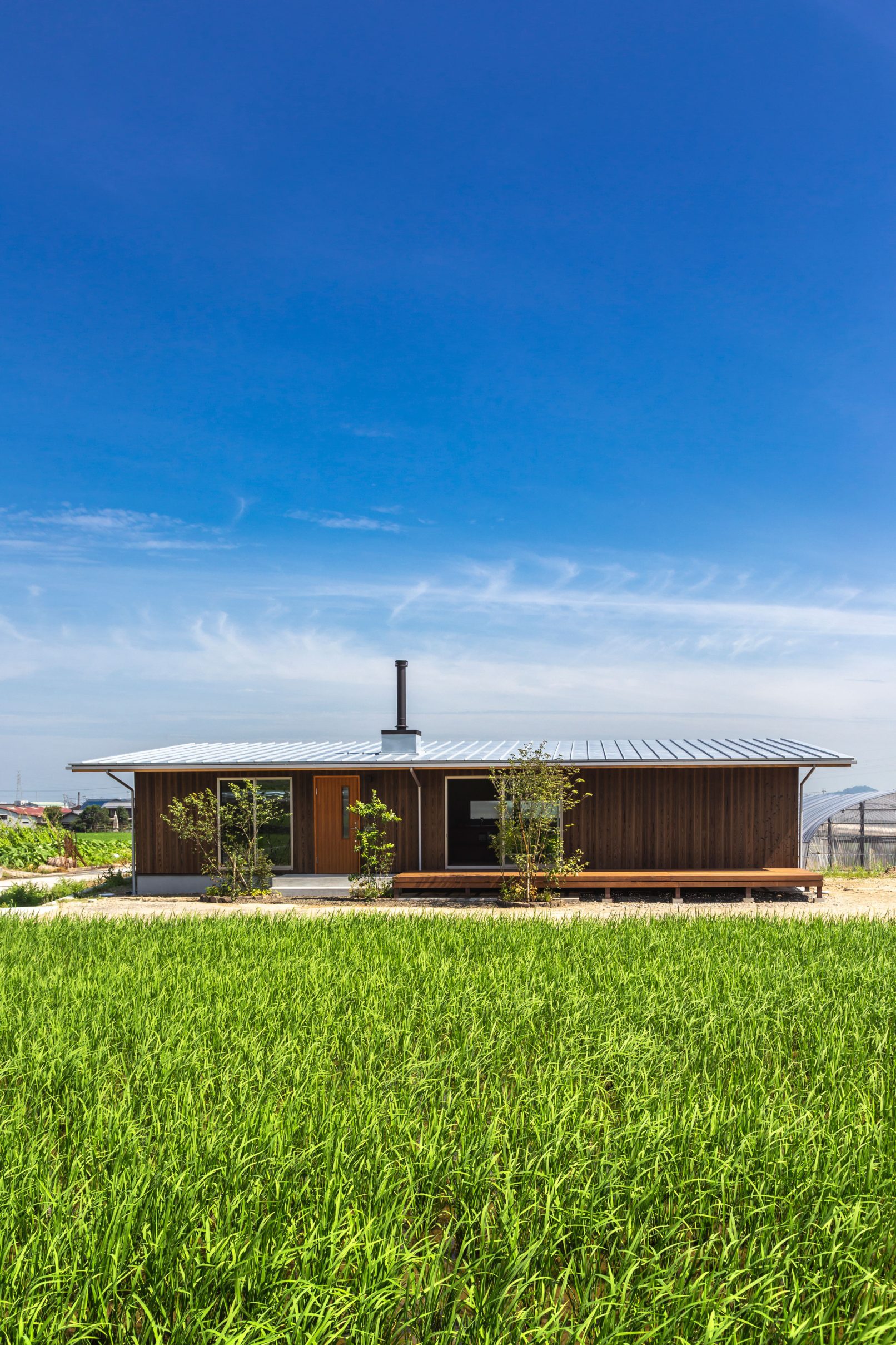 Modern rural house with Yakisugi a.k.a Shousugiban cedar cladding and metal roof.