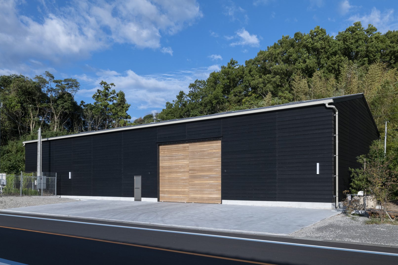 Custom black yakisugi cladding on a modern home exterior