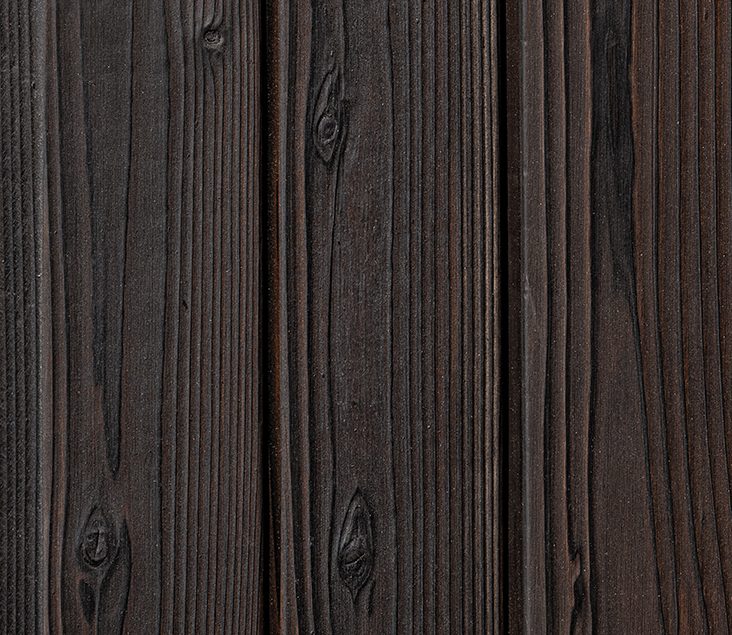 Close-up of Benii Clear Yakisugi a.k.a Shousugiban cedar timber cladding showing charred cedar grain texture.