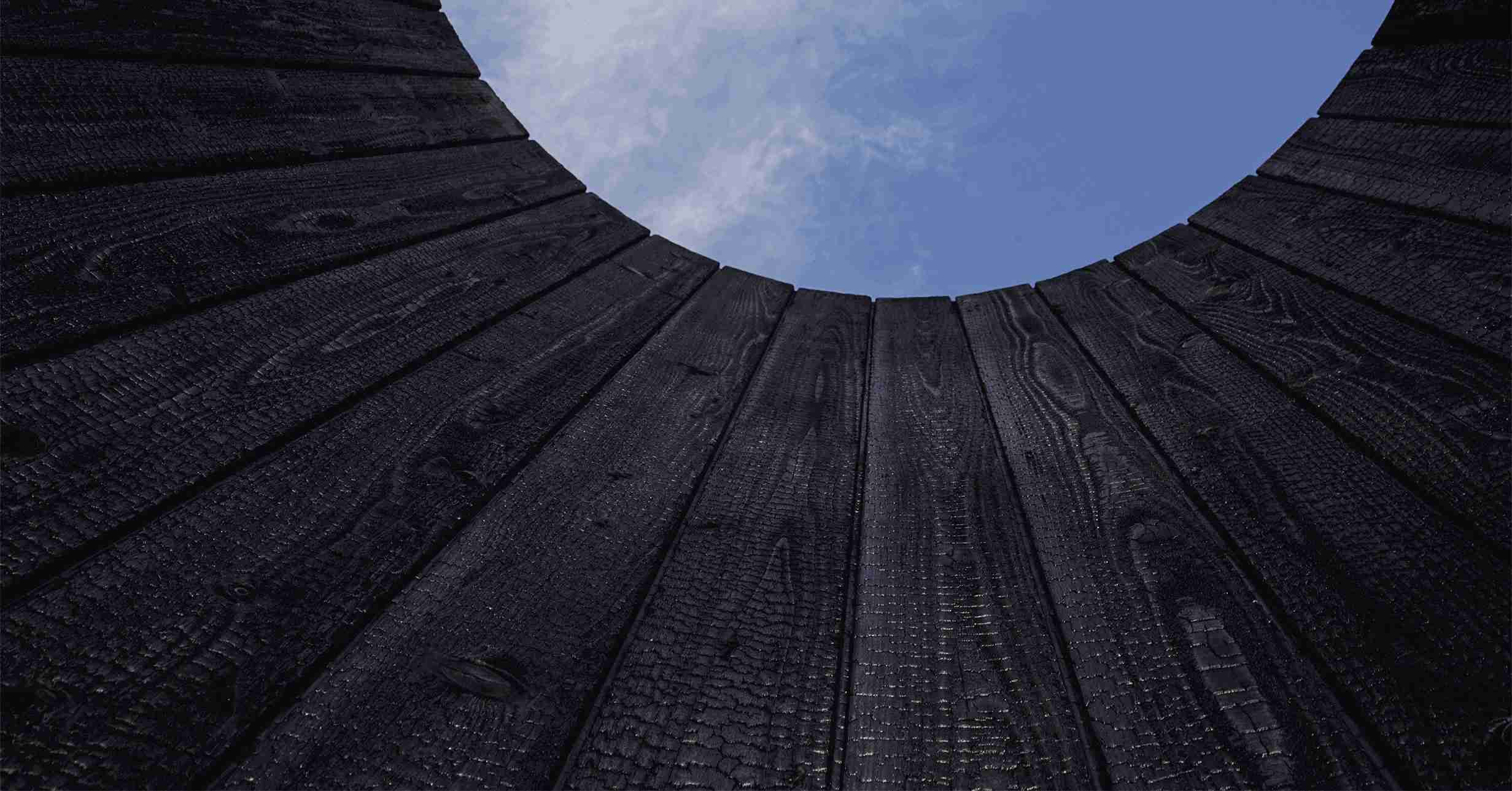 Hakuu Yakisugi Cedar Cladding Circular architectural wall clad with Hakuu Yakisugi a.k.a Shousugiban cedar timber cladding viewed from below.