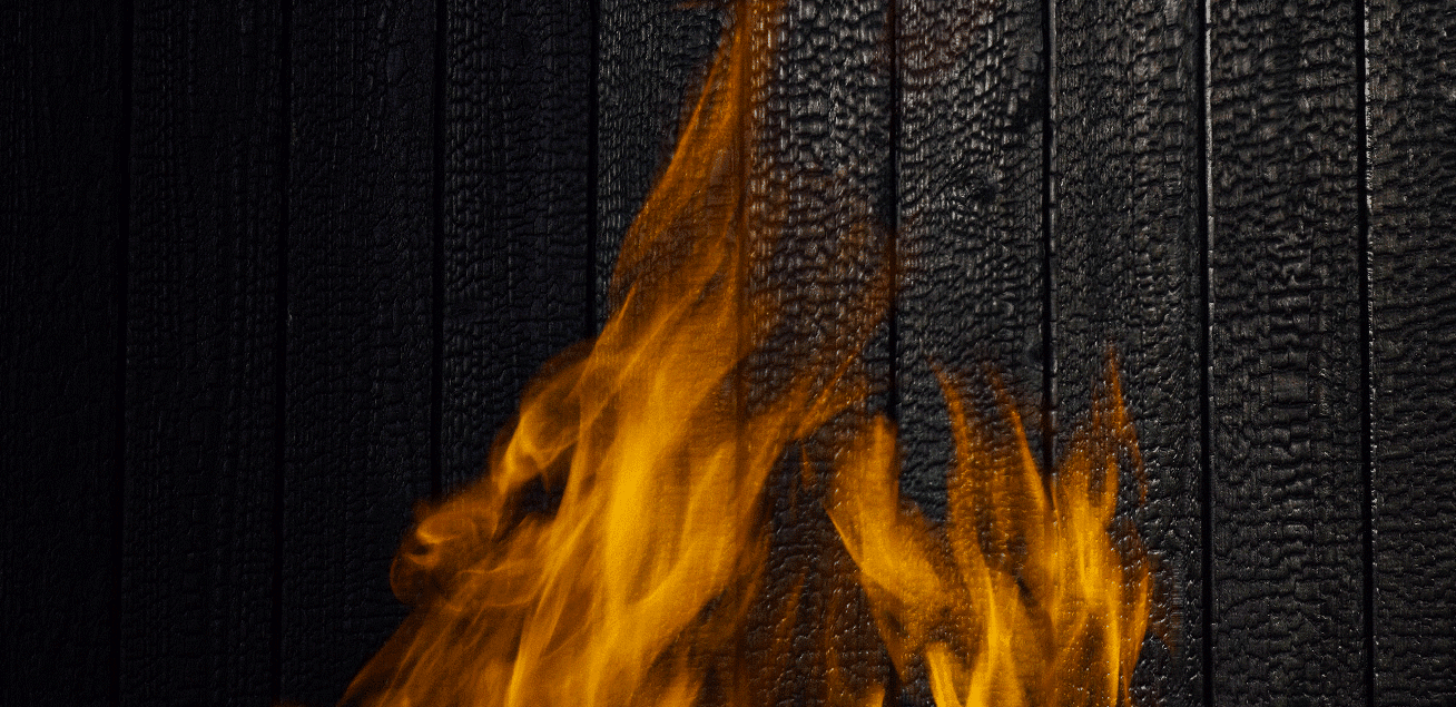 Yakisugi a.k.a Shousugiban charred cedar surface exposed to flame demonstrating durability.