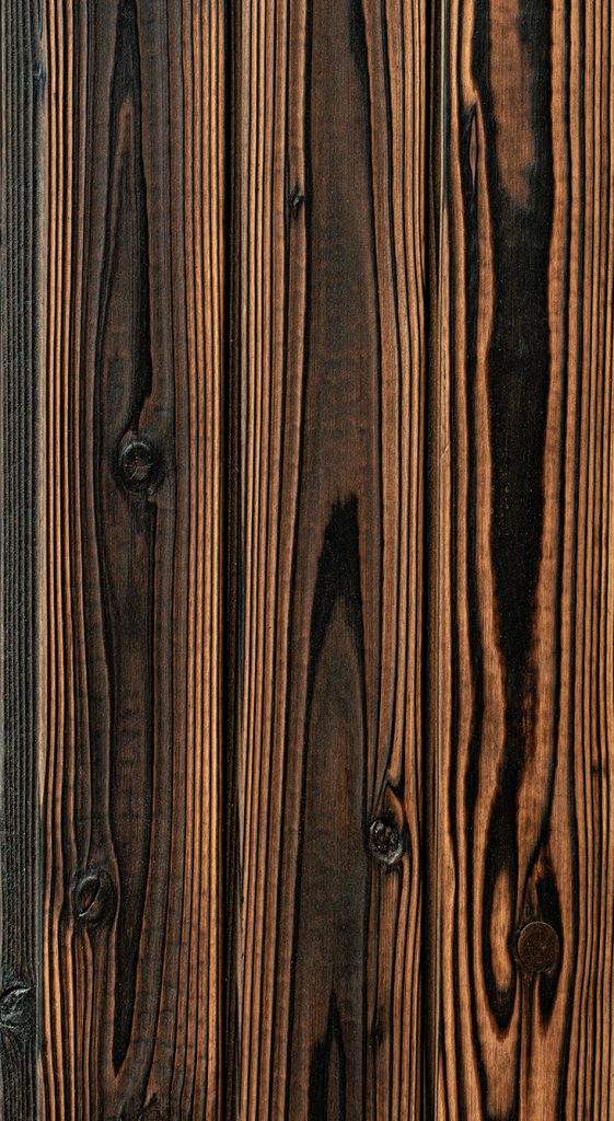 Close-up of Sumii Clear Yakisugi a.k.a Shousugiban cedar timber cladding showing charred cedar grain texture.