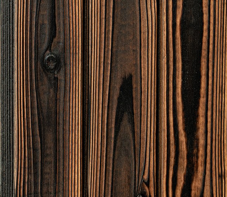 Close-up of Sumii Clear Yakisugi a.k.a Shousugiban cedar timber cladding showing charred cedar grain texture.