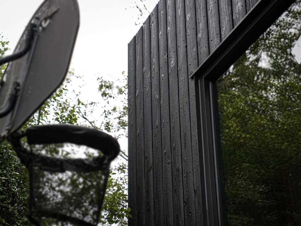 Hakuu Black Yakisugi Cedar Cladding Hakuu Black yakisugi cladding beside a window on the Glen Iris House facade, Melbourne